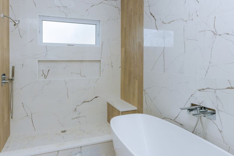 Marble Tile Accents in Shower Area